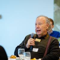 alumni speaking during luncheon